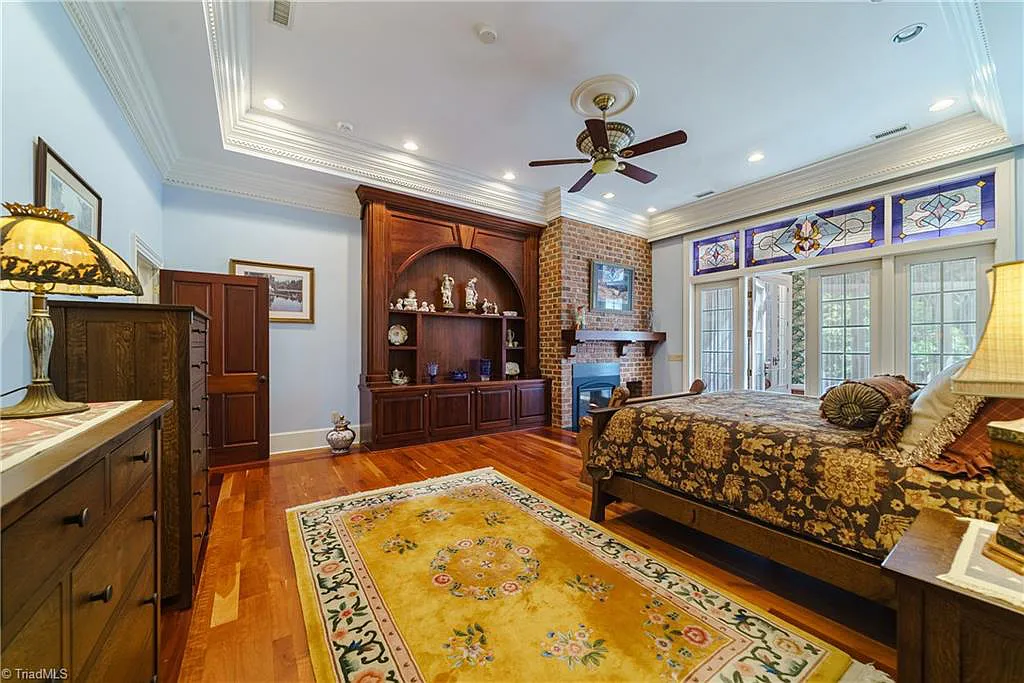 5712 Summit Road Home in Purlear, North Carolina. Explore this exceptional 128+ acre mountain retreat with a gated entrance, a timber-frame home boasting 5 bedrooms and 5 bathrooms. Enjoy the beauty of two spring-fed creeks that encircle the fieldstone exterior of the home.