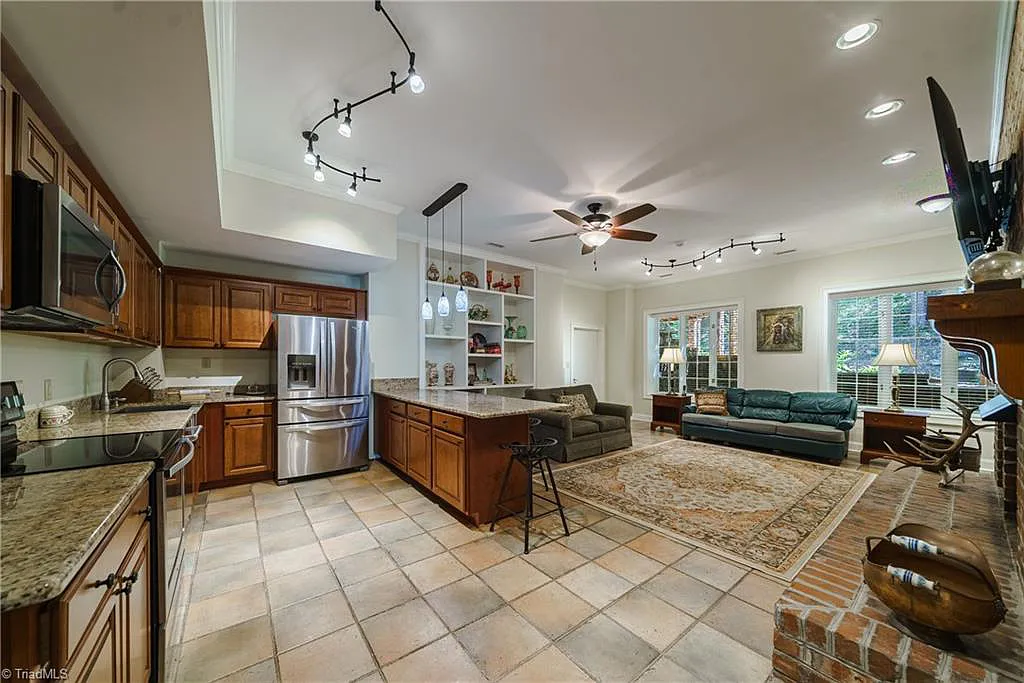 5712 Summit Road Home in Purlear, North Carolina. Explore this exceptional 128+ acre mountain retreat with a gated entrance, a timber-frame home boasting 5 bedrooms and 5 bathrooms. Enjoy the beauty of two spring-fed creeks that encircle the fieldstone exterior of the home.