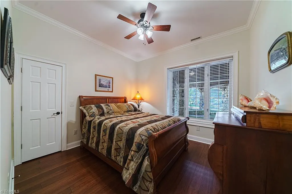 5712 Summit Road Home in Purlear, North Carolina. Explore this exceptional 128+ acre mountain retreat with a gated entrance, a timber-frame home boasting 5 bedrooms and 5 bathrooms. Enjoy the beauty of two spring-fed creeks that encircle the fieldstone exterior of the home.