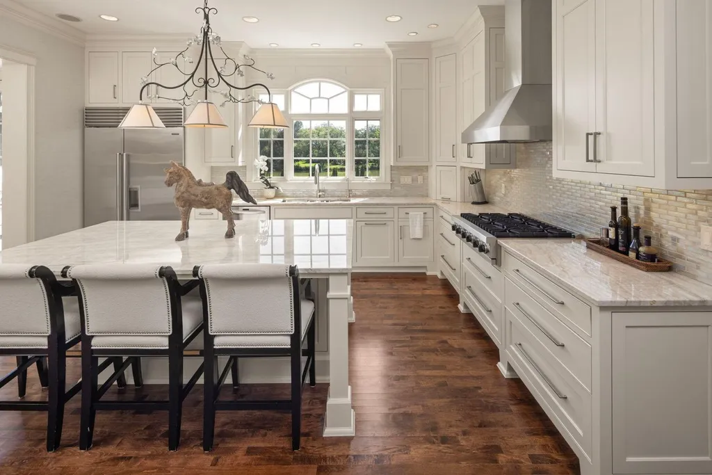 5805 Mait Lane Home in Edina, Minnesota. This stunning Rolling Green home, designed by Steiner & Koppelman and tastefully remodeled by TEA2 Design, offers high ceilings, meticulous attention to detail, and breathtaking south-facing views.