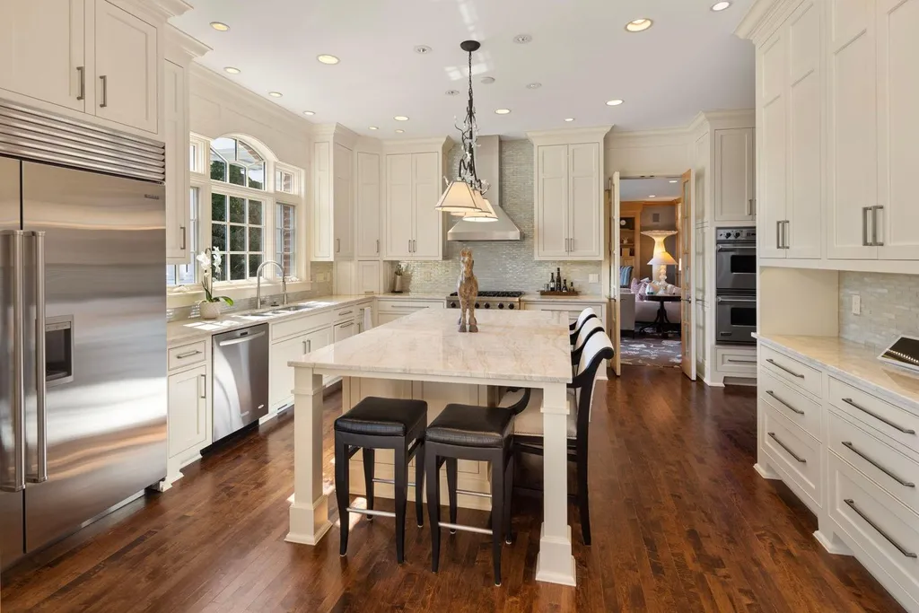 5805 Mait Lane Home in Edina, Minnesota. This stunning Rolling Green home, designed by Steiner & Koppelman and tastefully remodeled by TEA2 Design, offers high ceilings, meticulous attention to detail, and breathtaking south-facing views.