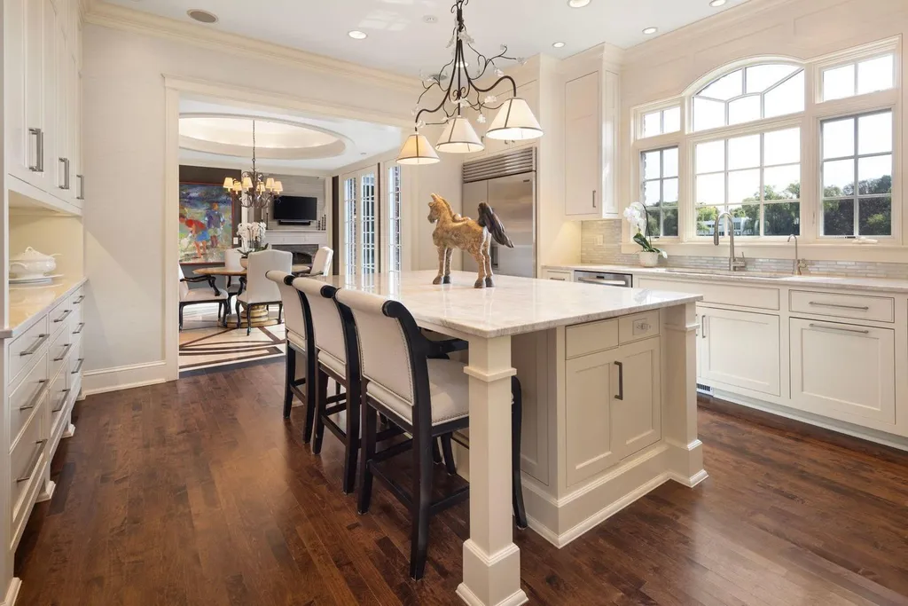 5805 Mait Lane Home in Edina, Minnesota. This stunning Rolling Green home, designed by Steiner & Koppelman and tastefully remodeled by TEA2 Design, offers high ceilings, meticulous attention to detail, and breathtaking south-facing views.