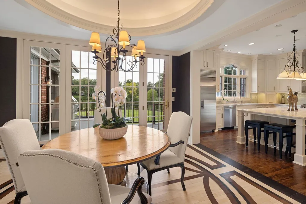 5805 Mait Lane Home in Edina, Minnesota. This stunning Rolling Green home, designed by Steiner & Koppelman and tastefully remodeled by TEA2 Design, offers high ceilings, meticulous attention to detail, and breathtaking south-facing views.