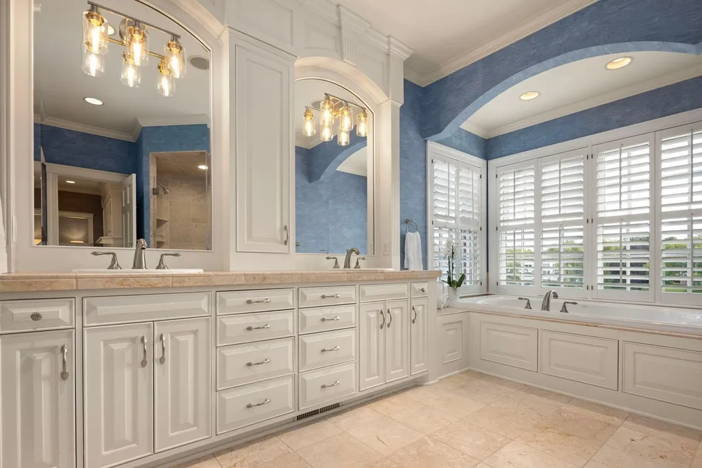 5805 Mait Lane Home in Edina, Minnesota. This stunning Rolling Green home, designed by Steiner & Koppelman and tastefully remodeled by TEA2 Design, offers high ceilings, meticulous attention to detail, and breathtaking south-facing views.