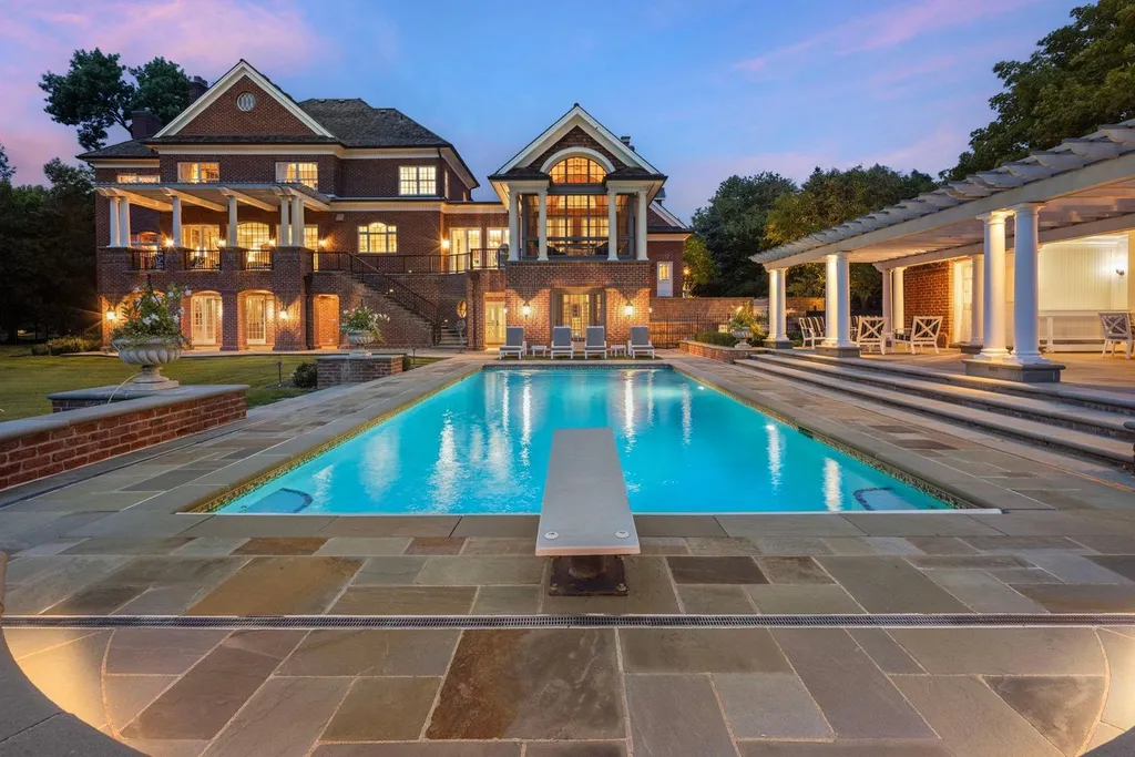 5805 Mait Lane Home in Edina, Minnesota. This stunning Rolling Green home, designed by Steiner & Koppelman and tastefully remodeled by TEA2 Design, offers high ceilings, meticulous attention to detail, and breathtaking south-facing views.