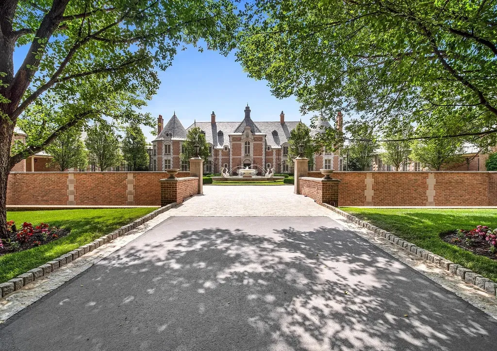 841 Merion Square Road Home in Gladwyne, Pennsylvania. This exceptional French Chateau estate, a rare gem designed by renowned architect F.L. Bissinger, awaits its new owner. Nestled on over 7 private and serene acres in prestigious Gladwyne, this regal compound is surrounded by meticulously manicured gardens, lush grounds, majestic fountains, and towering trees, offering an ambiance of unparalleled grandeur.