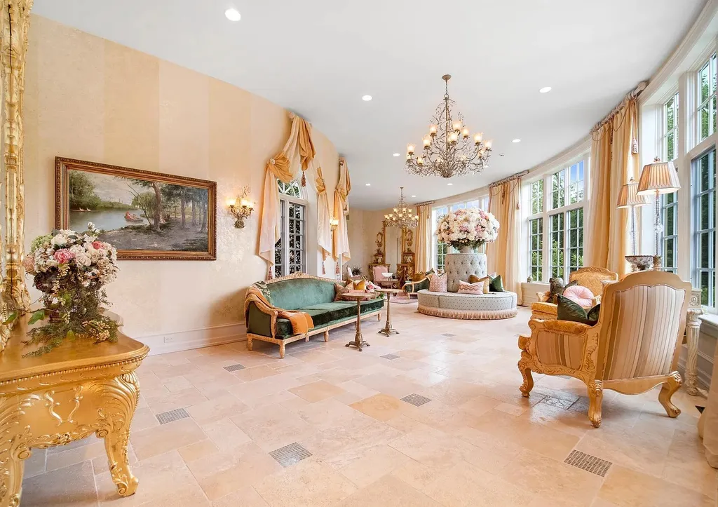 841 Merion Square Road Home in Gladwyne, Pennsylvania. This exceptional French Chateau estate, a rare gem designed by renowned architect F.L. Bissinger, awaits its new owner. Nestled on over 7 private and serene acres in prestigious Gladwyne, this regal compound is surrounded by meticulously manicured gardens, lush grounds, majestic fountains, and towering trees, offering an ambiance of unparalleled grandeur.