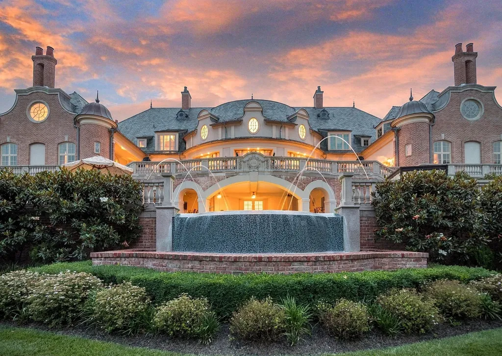 841 Merion Square Road Home in Gladwyne, Pennsylvania. This exceptional French Chateau estate, a rare gem designed by renowned architect F.L. Bissinger, awaits its new owner. Nestled on over 7 private and serene acres in prestigious Gladwyne, this regal compound is surrounded by meticulously manicured gardens, lush grounds, majestic fountains, and towering trees, offering an ambiance of unparalleled grandeur.