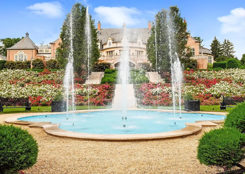 841 Merion Square Road Home in Gladwyne, Pennsylvania. This exceptional French Chateau estate, a rare gem designed by renowned architect F.L. Bissinger, awaits its new owner. Nestled on over 7 private and serene acres in prestigious Gladwyne, this regal compound is surrounded by meticulously manicured gardens, lush grounds, majestic fountains, and towering trees, offering an ambiance of unparalleled grandeur.