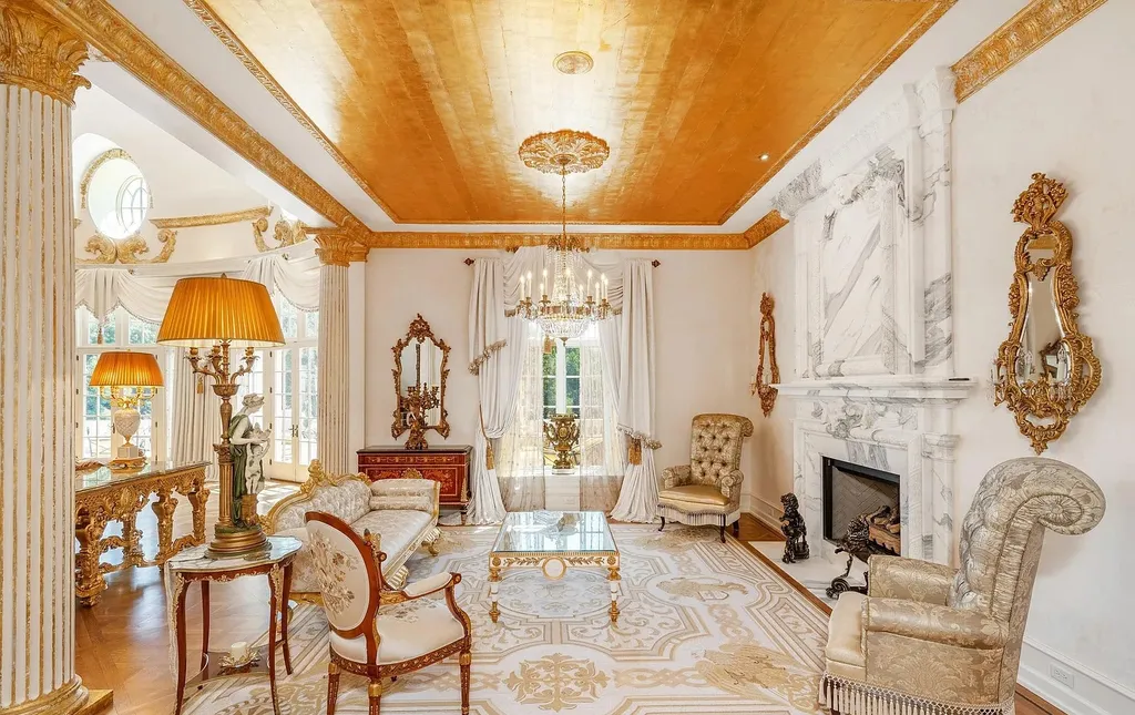 841 Merion Square Road Home in Gladwyne, Pennsylvania. This exceptional French Chateau estate, a rare gem designed by renowned architect F.L. Bissinger, awaits its new owner. Nestled on over 7 private and serene acres in prestigious Gladwyne, this regal compound is surrounded by meticulously manicured gardens, lush grounds, majestic fountains, and towering trees, offering an ambiance of unparalleled grandeur.