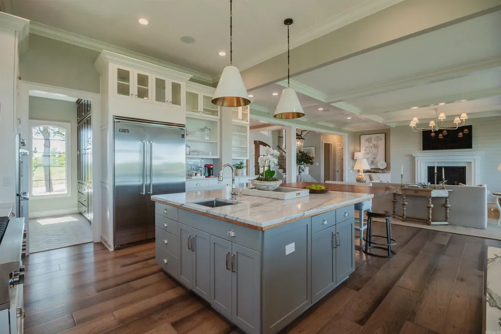 Lakefront Luxury Living: Exquisite Custom Home with Beaver Lake Views in Arkansas Listed at $3,850,000 22 8919 Castleberry Way Home in Rogers, Arkansas. Discover the epitome of luxury living on a sought-after .97-acre lot with breathtaking Beaver Lake views. This custom-built home is a masterpiece, boasting meticulously landscaped grounds and thoughtfully designed spaces for both formal and casual living.