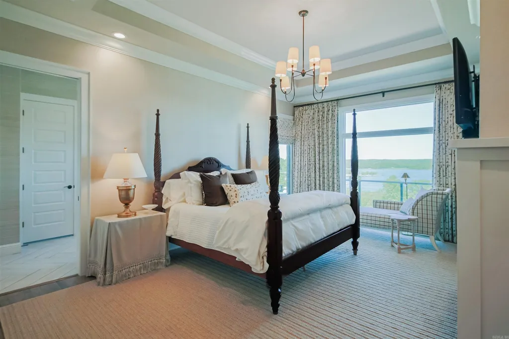 Lakefront Luxury Living: Exquisite Custom Home with Beaver Lake Views in Arkansas Listed at $3,850,000 27 8919 Castleberry Way Home in Rogers, Arkansas. Discover the epitome of luxury living on a sought-after .97-acre lot with breathtaking Beaver Lake views. This custom-built home is a masterpiece, boasting meticulously landscaped grounds and thoughtfully designed spaces for both formal and casual living.