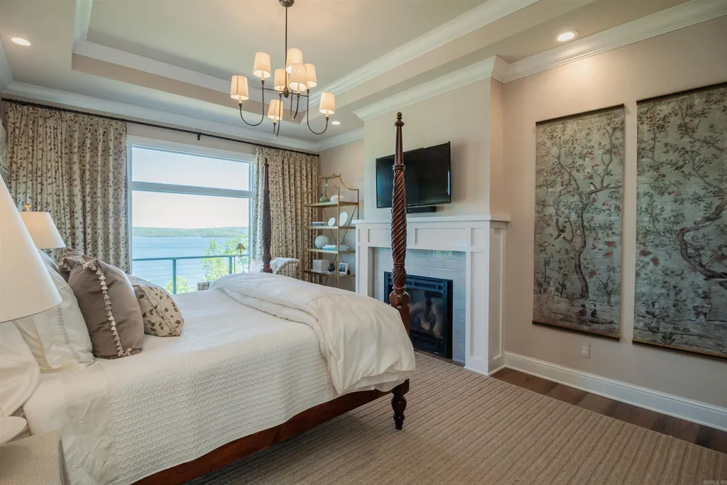 Lakefront Luxury Living: Exquisite Custom Home with Beaver Lake Views in Arkansas Listed at $3,850,000 28 8919 Castleberry Way Home in Rogers, Arkansas. Discover the epitome of luxury living on a sought-after .97-acre lot with breathtaking Beaver Lake views. This custom-built home is a masterpiece, boasting meticulously landscaped grounds and thoughtfully designed spaces for both formal and casual living.