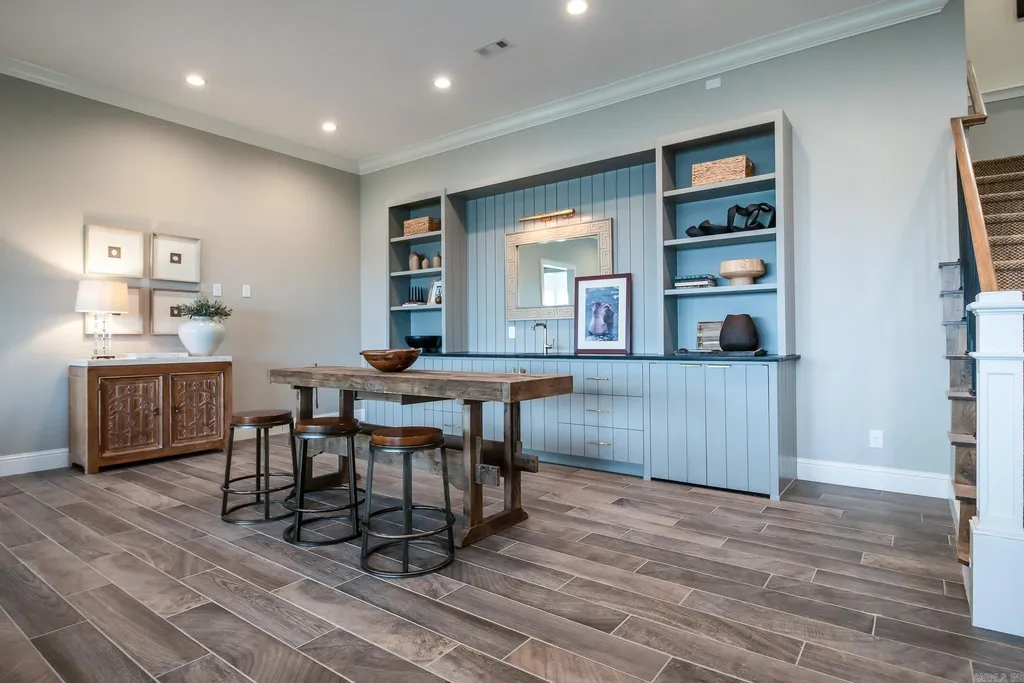 Lakefront Luxury Living: Exquisite Custom Home with Beaver Lake Views in Arkansas Listed at $3,850,000 34 8919 Castleberry Way Home in Rogers, Arkansas. Discover the epitome of luxury living on a sought-after .97-acre lot with breathtaking Beaver Lake views. This custom-built home is a masterpiece, boasting meticulously landscaped grounds and thoughtfully designed spaces for both formal and casual living.