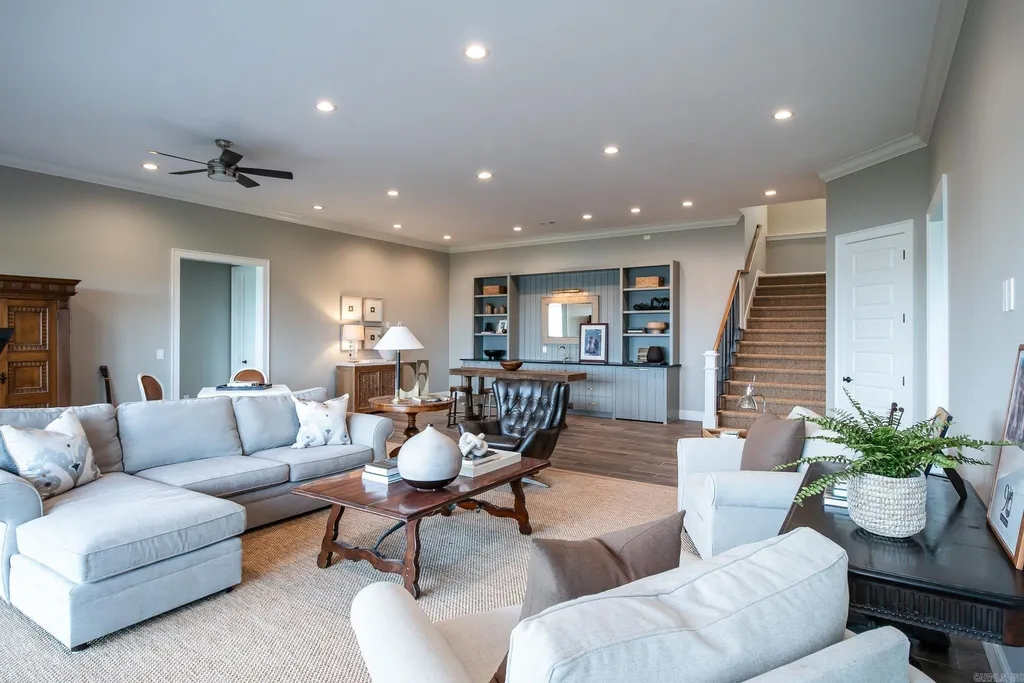 Lakefront Luxury Living: Exquisite Custom Home with Beaver Lake Views in Arkansas Listed at $3,850,000 35 8919 Castleberry Way Home in Rogers, Arkansas. Discover the epitome of luxury living on a sought-after .97-acre lot with breathtaking Beaver Lake views. This custom-built home is a masterpiece, boasting meticulously landscaped grounds and thoughtfully designed spaces for both formal and casual living.