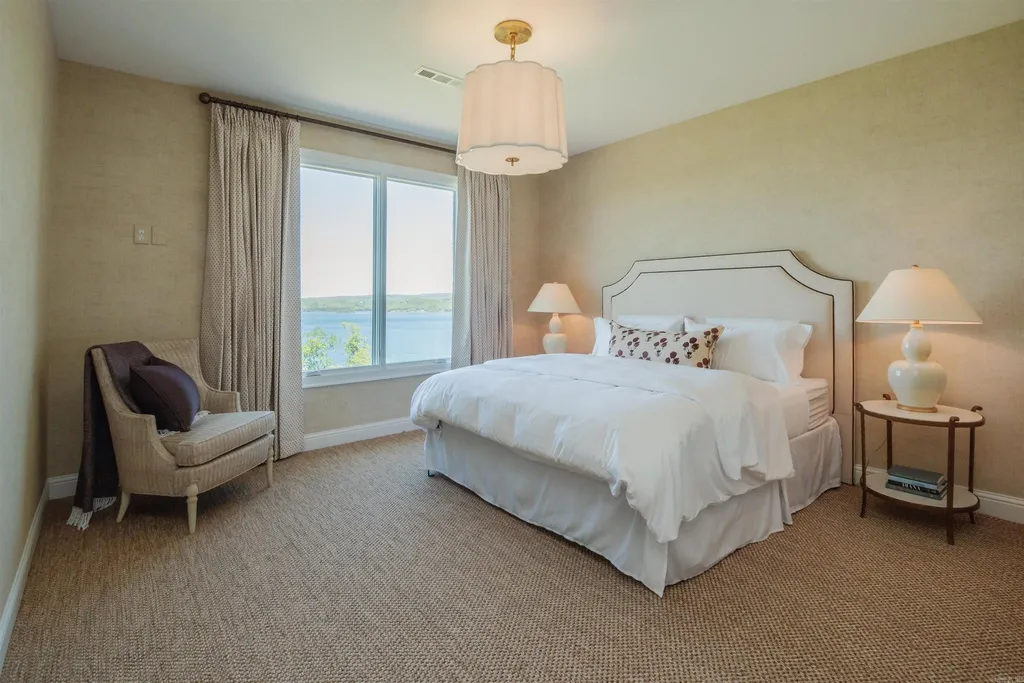 Lakefront Luxury Living: Exquisite Custom Home with Beaver Lake Views in Arkansas Listed at $3,850,000 37 8919 Castleberry Way Home in Rogers, Arkansas. Discover the epitome of luxury living on a sought-after .97-acre lot with breathtaking Beaver Lake views. This custom-built home is a masterpiece, boasting meticulously landscaped grounds and thoughtfully designed spaces for both formal and casual living.