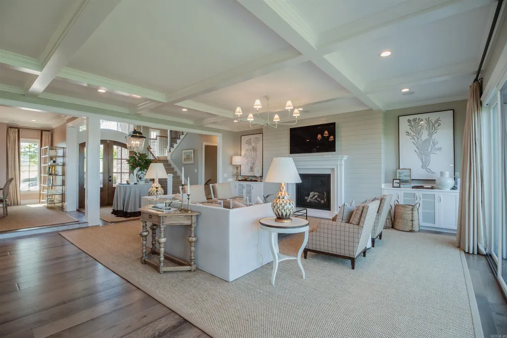 Lakefront Luxury Living: Exquisite Custom Home with Beaver Lake Views in Arkansas Listed at $3,850,000 15 8919 Castleberry Way Home in Rogers, Arkansas. Discover the epitome of luxury living on a sought-after .97-acre lot with breathtaking Beaver Lake views. This custom-built home is a masterpiece, boasting meticulously landscaped grounds and thoughtfully designed spaces for both formal and casual living.