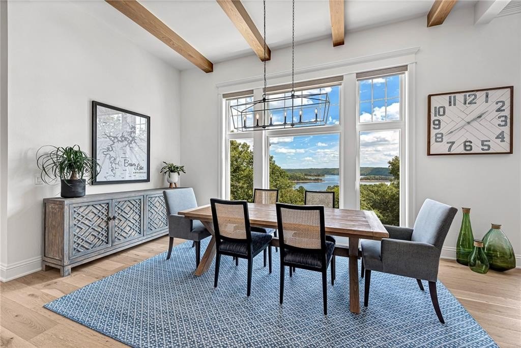 9966 Old Campbell Road Home in Rogers, Arkansas. Prepare to be captivated by this extraordinary 5-bedroom, 6.5-bathroom, 8,321 sqft estate, nestled on 6 acres in Rogers. It includes ownership of TWO slips in a co-owned boat dock, granting exclusive access to pristine Beaver Lake.