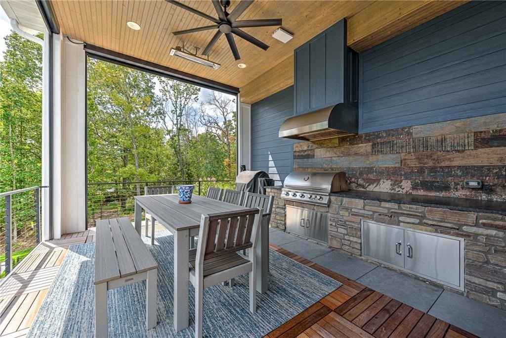 9966 Old Campbell Road Home in Rogers, Arkansas. Prepare to be captivated by this extraordinary 5-bedroom, 6.5-bathroom, 8,321 sqft estate, nestled on 6 acres in Rogers. It includes ownership of TWO slips in a co-owned boat dock, granting exclusive access to pristine Beaver Lake.