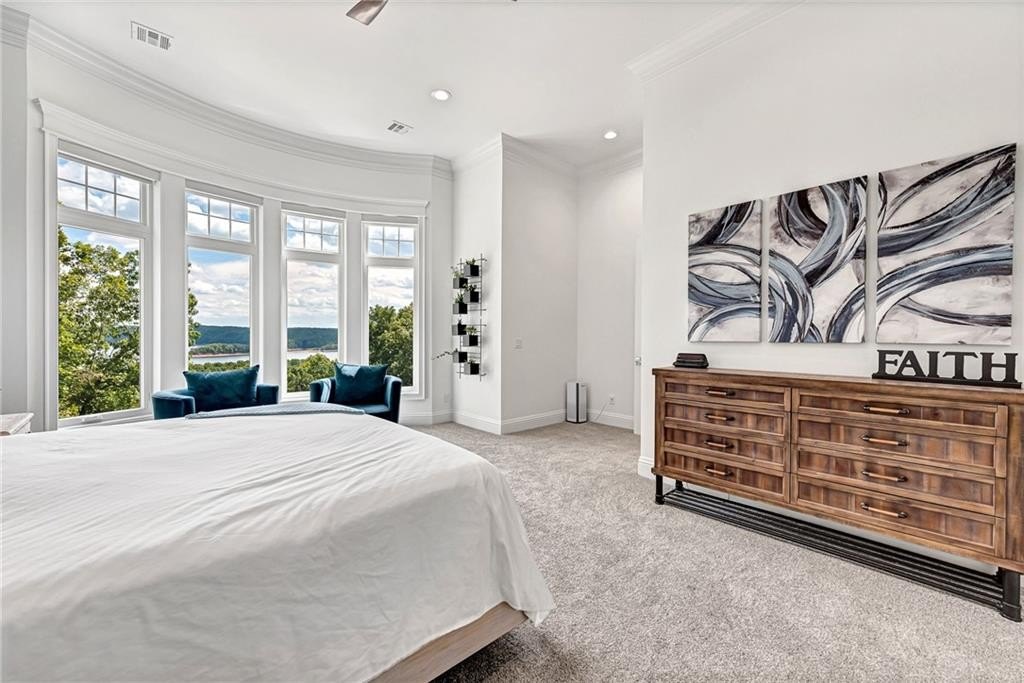 9966 Old Campbell Road Home in Rogers, Arkansas. Prepare to be captivated by this extraordinary 5-bedroom, 6.5-bathroom, 8,321 sqft estate, nestled on 6 acres in Rogers. It includes ownership of TWO slips in a co-owned boat dock, granting exclusive access to pristine Beaver Lake.