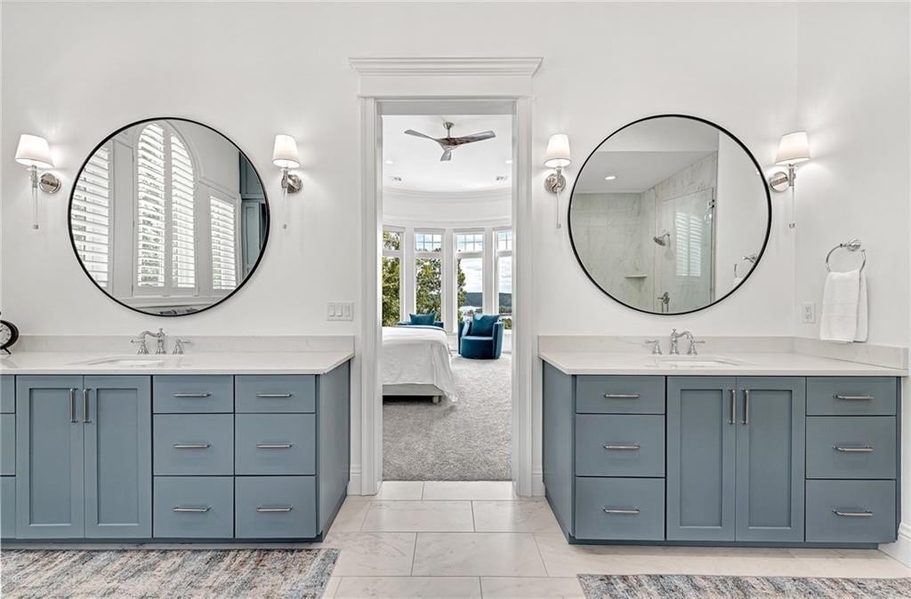 9966 Old Campbell Road Home in Rogers, Arkansas. Prepare to be captivated by this extraordinary 5-bedroom, 6.5-bathroom, 8,321 sqft estate, nestled on 6 acres in Rogers. It includes ownership of TWO slips in a co-owned boat dock, granting exclusive access to pristine Beaver Lake.