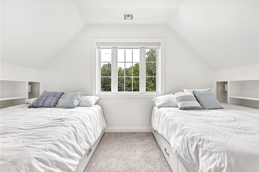 9966 Old Campbell Road Home in Rogers, Arkansas. Prepare to be captivated by this extraordinary 5-bedroom, 6.5-bathroom, 8,321 sqft estate, nestled on 6 acres in Rogers. It includes ownership of TWO slips in a co-owned boat dock, granting exclusive access to pristine Beaver Lake.