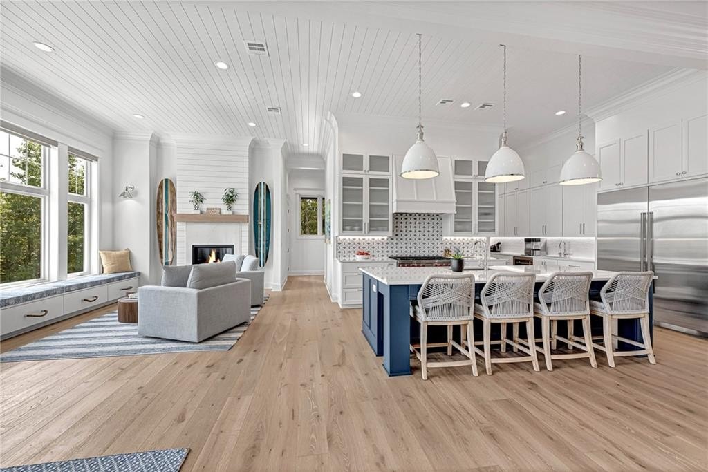 9966 Old Campbell Road Home in Rogers, Arkansas. Prepare to be captivated by this extraordinary 5-bedroom, 6.5-bathroom, 8,321 sqft estate, nestled on 6 acres in Rogers. It includes ownership of TWO slips in a co-owned boat dock, granting exclusive access to pristine Beaver Lake.