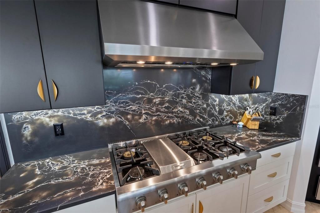 Discover the epitome of luxury living at 2 River Falls Drive, Cocoa Beach, Florida. This 5-bedroom, 6-bathroom custom estate, fully remodeled in 2022, offers 150 feet of pristine river frontage and unobstructed views.