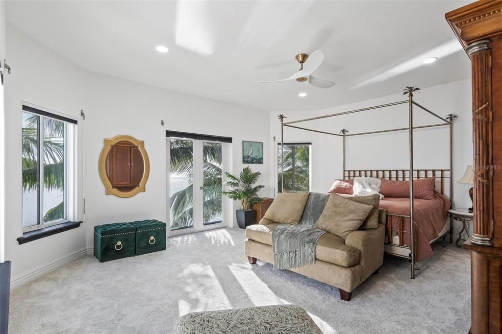 Discover the epitome of luxury living at 2 River Falls Drive, Cocoa Beach, Florida. This 5-bedroom, 6-bathroom custom estate, fully remodeled in 2022, offers 150 feet of pristine river frontage and unobstructed views.