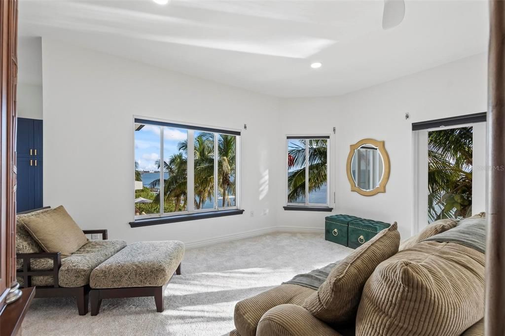 Discover the epitome of luxury living at 2 River Falls Drive, Cocoa Beach, Florida. This 5-bedroom, 6-bathroom custom estate, fully remodeled in 2022, offers 150 feet of pristine river frontage and unobstructed views.
