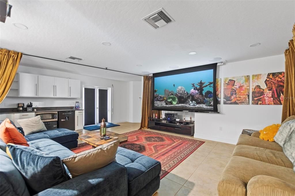 Discover the epitome of luxury living at 2 River Falls Drive, Cocoa Beach, Florida. This 5-bedroom, 6-bathroom custom estate, fully remodeled in 2022, offers 150 feet of pristine river frontage and unobstructed views.