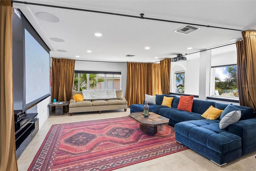 Discover the epitome of luxury living at 2 River Falls Drive, Cocoa Beach, Florida. This 5-bedroom, 6-bathroom custom estate, fully remodeled in 2022, offers 150 feet of pristine river frontage and unobstructed views.
