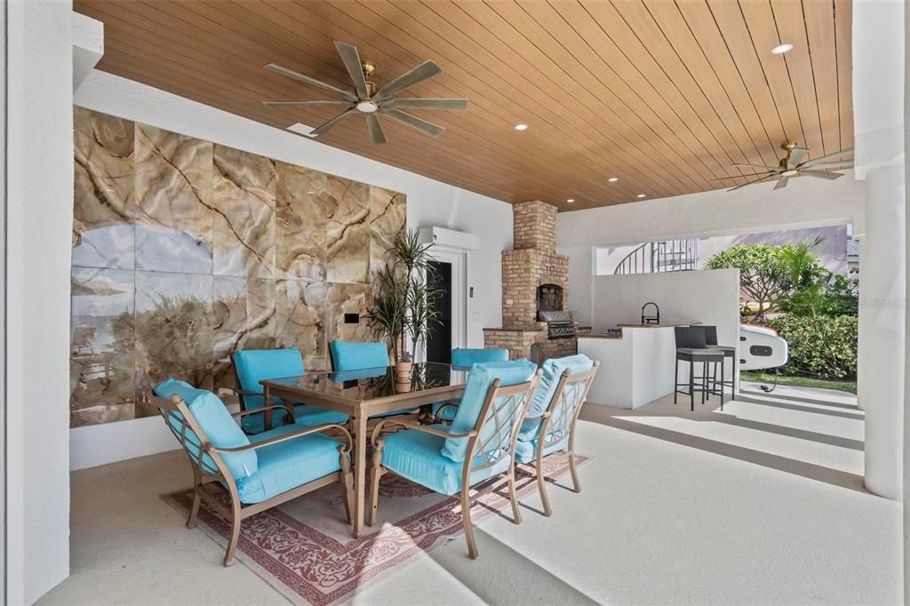 Discover the epitome of luxury living at 2 River Falls Drive, Cocoa Beach, Florida. This 5-bedroom, 6-bathroom custom estate, fully remodeled in 2022, offers 150 feet of pristine river frontage and unobstructed views.