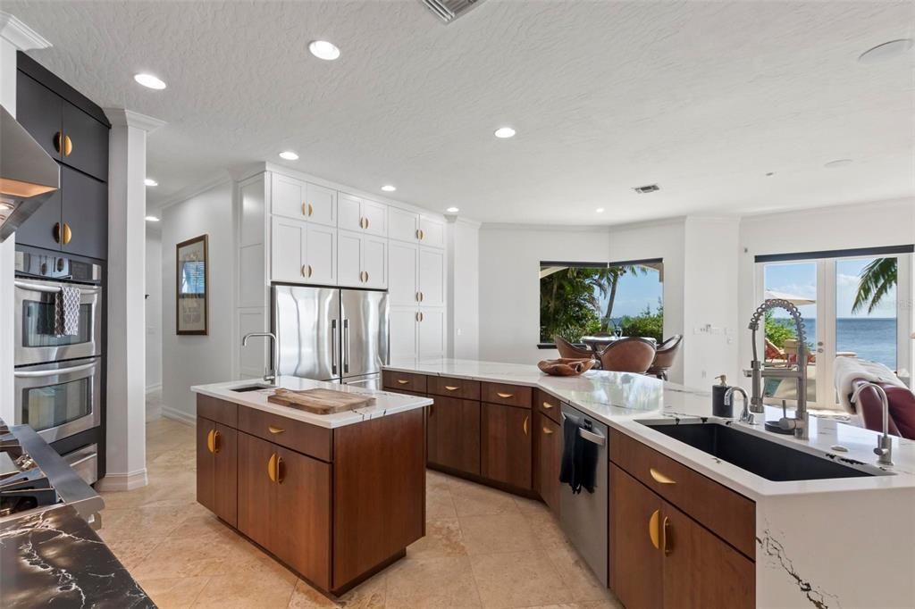 Discover the epitome of luxury living at 2 River Falls Drive, Cocoa Beach, Florida. This 5-bedroom, 6-bathroom custom estate, fully remodeled in 2022, offers 150 feet of pristine river frontage and unobstructed views.