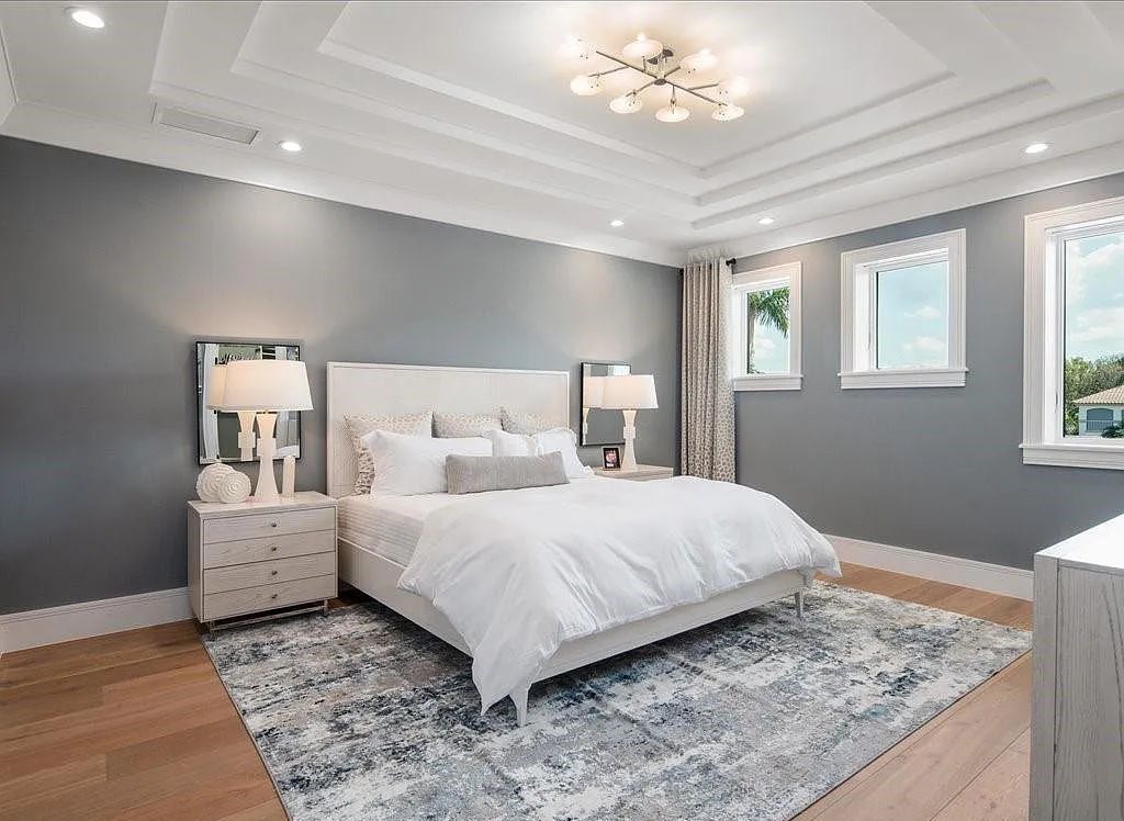 Experience waterfront luxury like never before at 3841 Crayton Road in Naples, Florida. This 5-bedroom, 6-bathroom masterpiece, built in 2023, is the result of a remarkable collaboration between Knauf Koenig, Falconer Jones, and Clive Daniel interior designers.