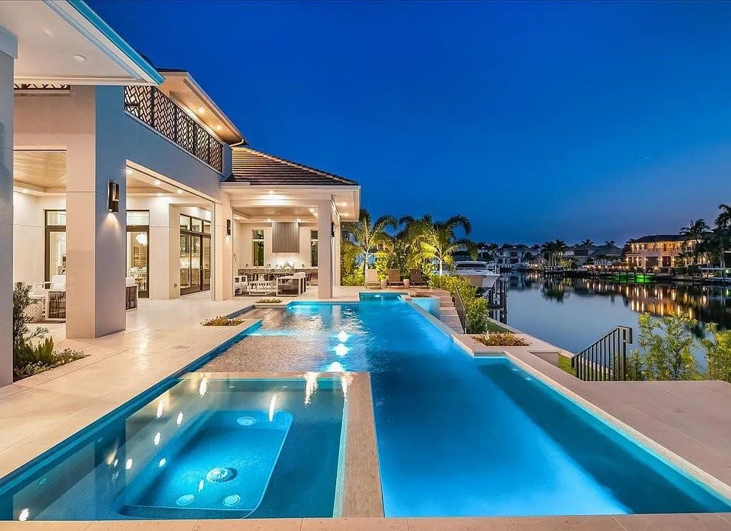 Experience waterfront luxury like never before at 3841 Crayton Road in Naples, Florida. This 5-bedroom, 6-bathroom masterpiece, built in 2023, is the result of a remarkable collaboration between Knauf Koenig, Falconer Jones, and Clive Daniel interior designers.