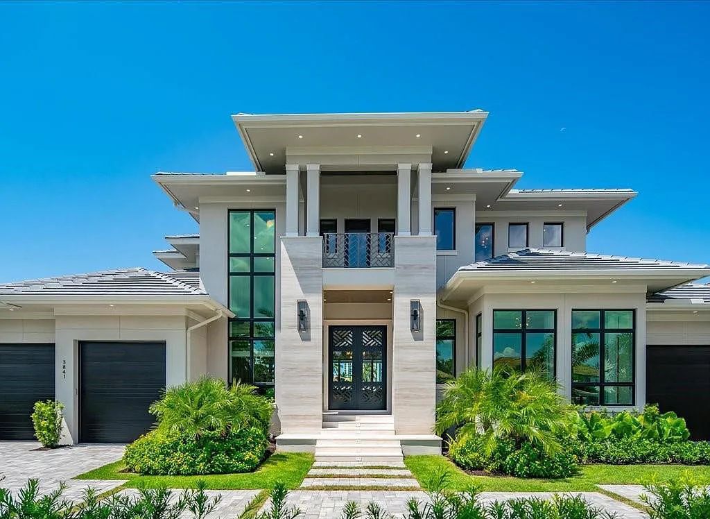 Experience waterfront luxury like never before at 3841 Crayton Road in Naples, Florida. This 5-bedroom, 6-bathroom masterpiece, built in 2023, is the result of a remarkable collaboration between Knauf Koenig, Falconer Jones, and Clive Daniel interior designers.