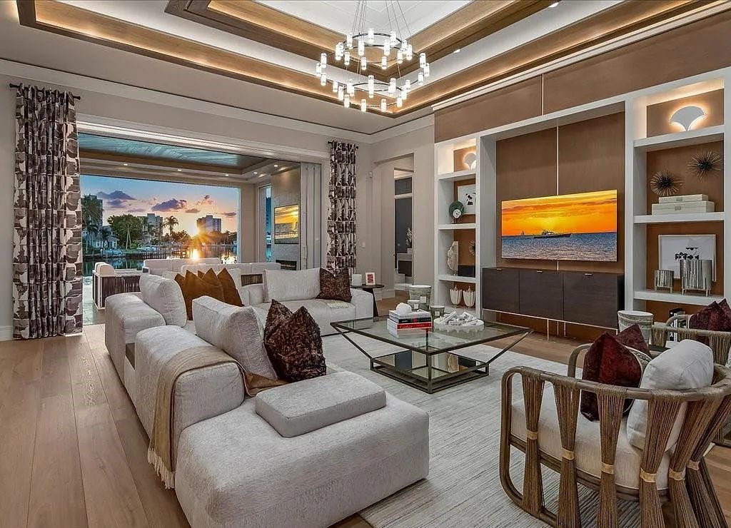 Experience waterfront luxury like never before at 3841 Crayton Road in Naples, Florida. This 5-bedroom, 6-bathroom masterpiece, built in 2023, is the result of a remarkable collaboration between Knauf Koenig, Falconer Jones, and Clive Daniel interior designers.