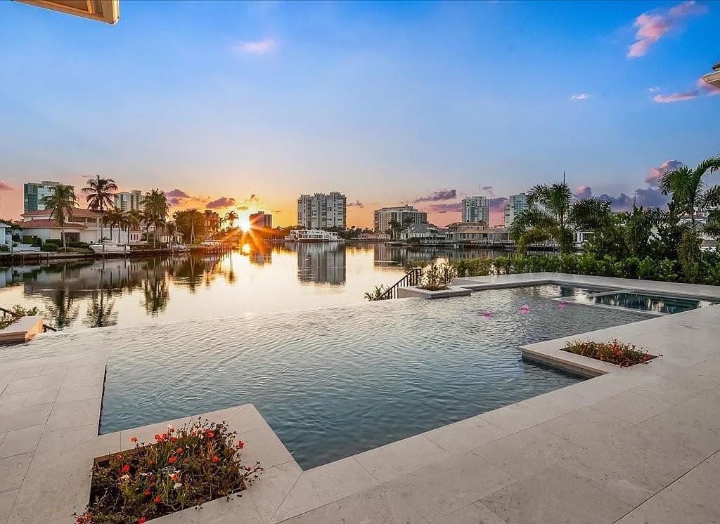 Experience waterfront luxury like never before at 3841 Crayton Road in Naples, Florida. This 5-bedroom, 6-bathroom masterpiece, built in 2023, is the result of a remarkable collaboration between Knauf Koenig, Falconer Jones, and Clive Daniel interior designers.