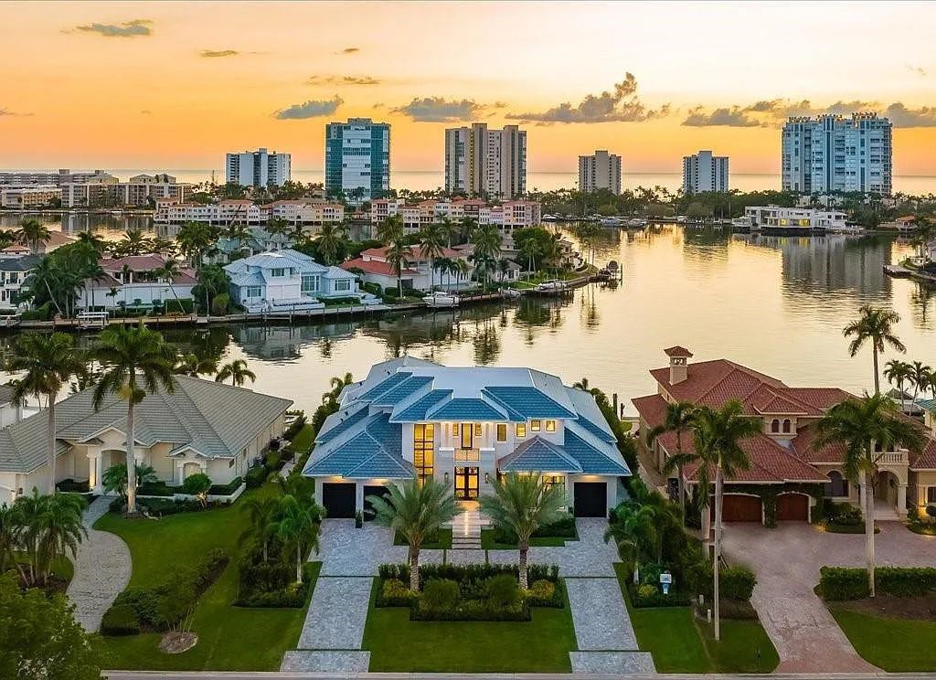 Experience waterfront luxury like never before at 3841 Crayton Road in Naples, Florida. This 5-bedroom, 6-bathroom masterpiece, built in 2023, is the result of a remarkable collaboration between Knauf Koenig, Falconer Jones, and Clive Daniel interior designers.