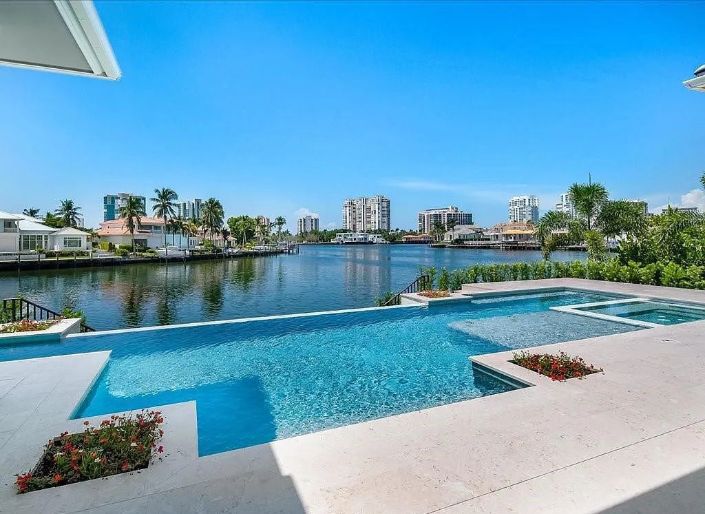 Experience waterfront luxury like never before at 3841 Crayton Road in Naples, Florida. This 5-bedroom, 6-bathroom masterpiece, built in 2023, is the result of a remarkable collaboration between Knauf Koenig, Falconer Jones, and Clive Daniel interior designers.