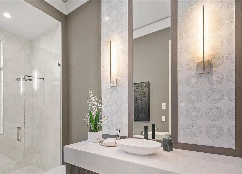 Experience waterfront luxury like never before at 3841 Crayton Road in Naples, Florida. This 5-bedroom, 6-bathroom masterpiece, built in 2023, is the result of a remarkable collaboration between Knauf Koenig, Falconer Jones, and Clive Daniel interior designers.