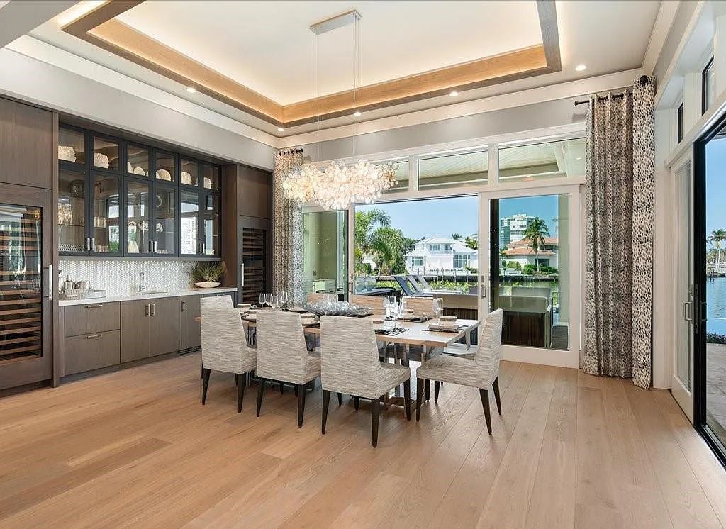 Experience waterfront luxury like never before at 3841 Crayton Road in Naples, Florida. This 5-bedroom, 6-bathroom masterpiece, built in 2023, is the result of a remarkable collaboration between Knauf Koenig, Falconer Jones, and Clive Daniel interior designers.