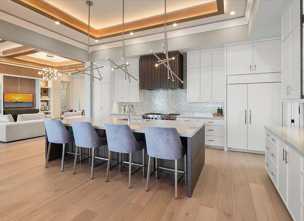 Experience waterfront luxury like never before at 3841 Crayton Road in Naples, Florida. This 5-bedroom, 6-bathroom masterpiece, built in 2023, is the result of a remarkable collaboration between Knauf Koenig, Falconer Jones, and Clive Daniel interior designers.