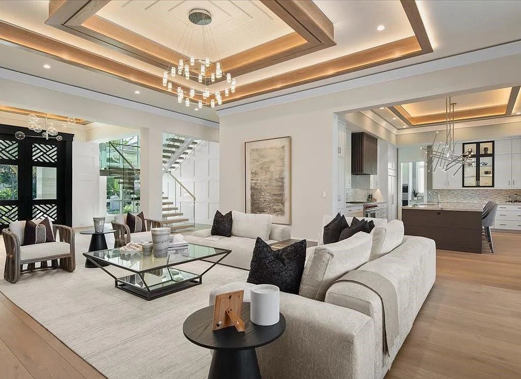 Experience waterfront luxury like never before at 3841 Crayton Road in Naples, Florida. This 5-bedroom, 6-bathroom masterpiece, built in 2023, is the result of a remarkable collaboration between Knauf Koenig, Falconer Jones, and Clive Daniel interior designers.