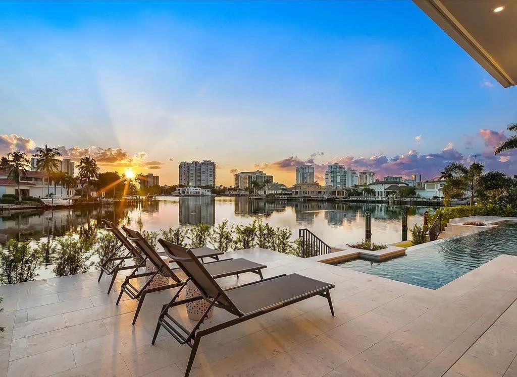 Experience waterfront luxury like never before at 3841 Crayton Road in Naples, Florida. This 5-bedroom, 6-bathroom masterpiece, built in 2023, is the result of a remarkable collaboration between Knauf Koenig, Falconer Jones, and Clive Daniel interior designers.