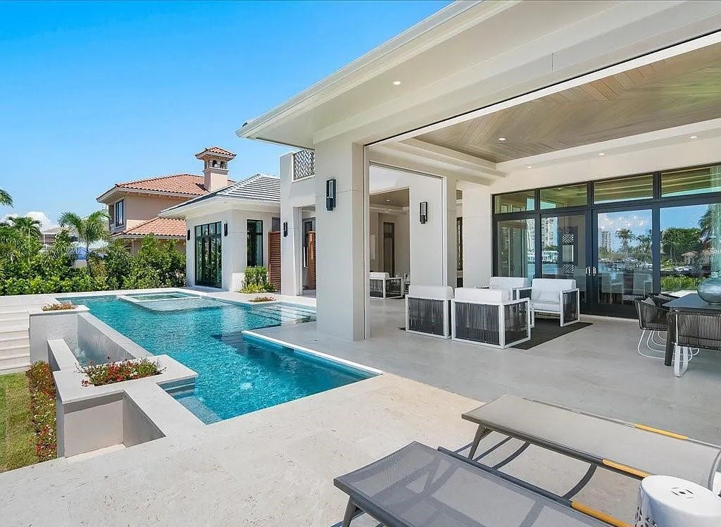 Experience waterfront luxury like never before at 3841 Crayton Road in Naples, Florida. This 5-bedroom, 6-bathroom masterpiece, built in 2023, is the result of a remarkable collaboration between Knauf Koenig, Falconer Jones, and Clive Daniel interior designers.
