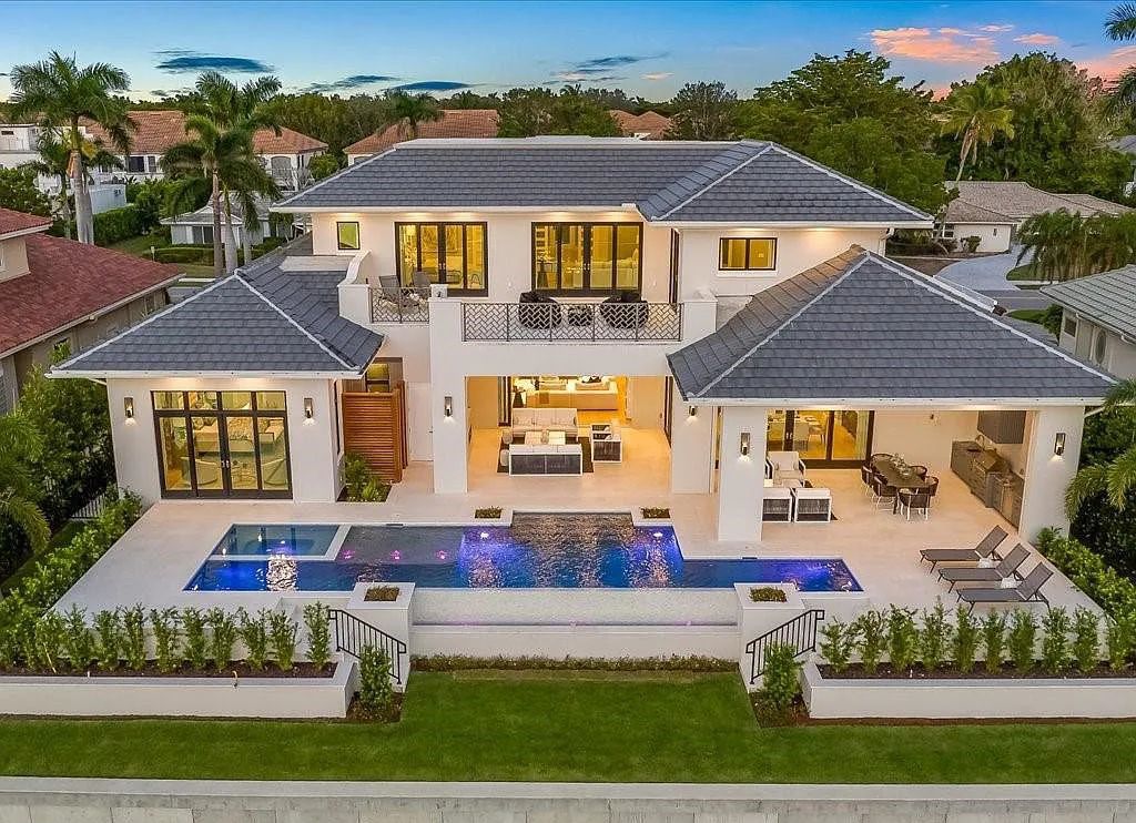Experience waterfront luxury like never before at 3841 Crayton Road in Naples, Florida. This 5-bedroom, 6-bathroom masterpiece, built in 2023, is the result of a remarkable collaboration between Knauf Koenig, Falconer Jones, and Clive Daniel interior designers.