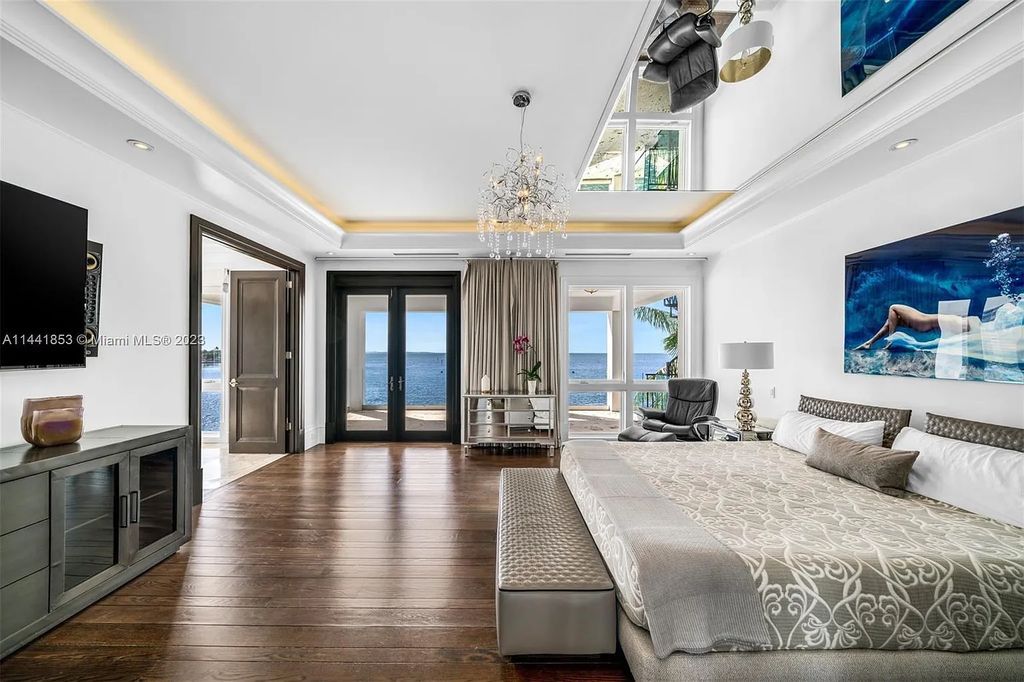 Discover the epitome of luxury waterfront living at 3590 Crystal View Court, Miami, Florida. This magnificent mansion offers 6 bedrooms, 10 bathrooms, and 13,930 square feet of living space on a spacious 0.45-acre lot.