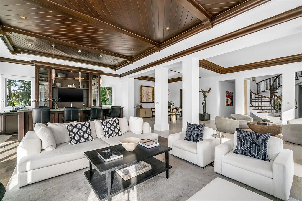Discover the epitome of luxury waterfront living at 3590 Crystal View Court, Miami, Florida. This magnificent mansion offers 6 bedrooms, 10 bathrooms, and 13,930 square feet of living space on a spacious 0.45-acre lot.